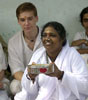 Amma shares a plate of food