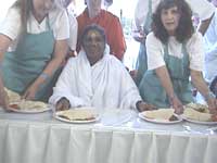 Amma serving dinner