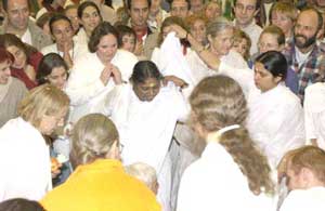 Amma gives darshan in Paris, France