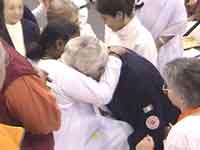 Fire-fighters come for Amma's darshan