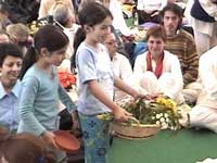 Little girls selling flowers