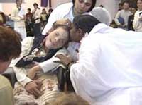 Amma kissing a devotee