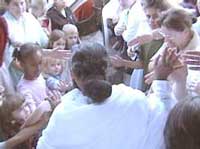 Amma giving darshan