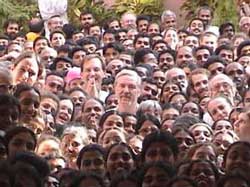 Group of people looking at Amma