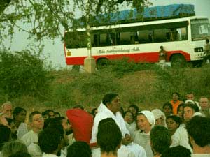 Amma meditating with tour group