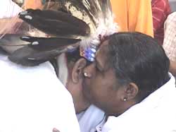 Amma gives darshan to a Native American Indian Chief