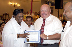 Amma with the mayor of Naperville, A. George Pradle