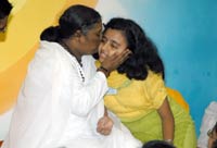 Amma giving darshan to medical student