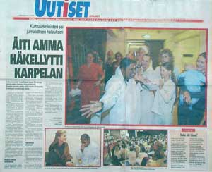 Finnish newspaper featuring Amma on page 1