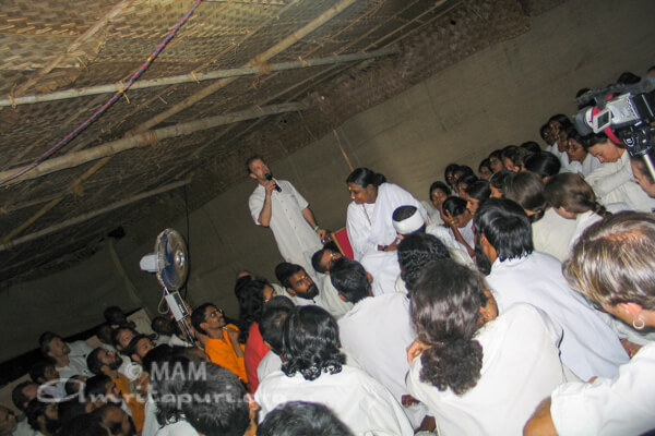 Amma with devotees on rooftop