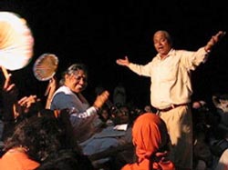 Devotee dancing for Amma