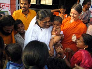 Amma holding a child