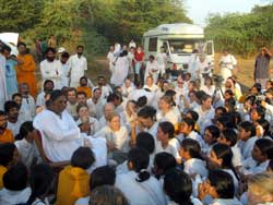 Amma with tour group, 2004