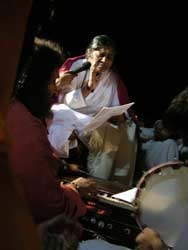 Amma sings bhajans at night