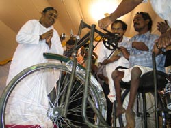 Amma gives away a wheelchair