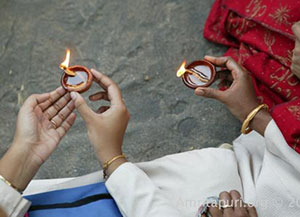 16 days later- Amma prays for the dead & the living