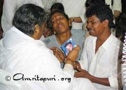 Amma consoling parents