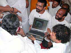 Amma with a laptop