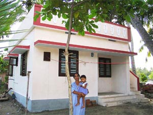 Ashram finishes its first 100 houses in Kerala