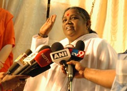 Amma being interviewed by the press