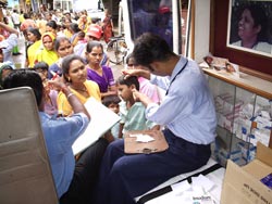 Distributing medicine from the AIMS ambulance