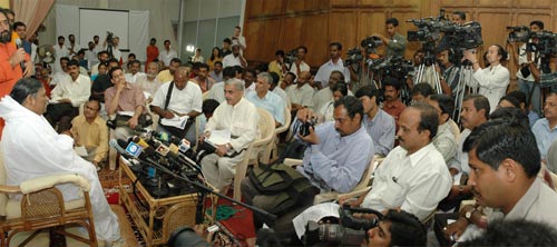 Amma talking to journalists