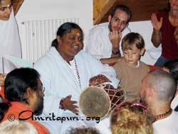 Amma playing the drum