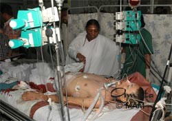 Amma visiting victims in the hospital