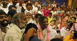 Amma giving darshan in Amritapuri