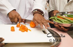 Amma is cutting vegetables