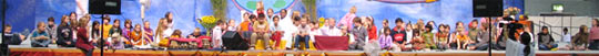 German children on stage with Amma