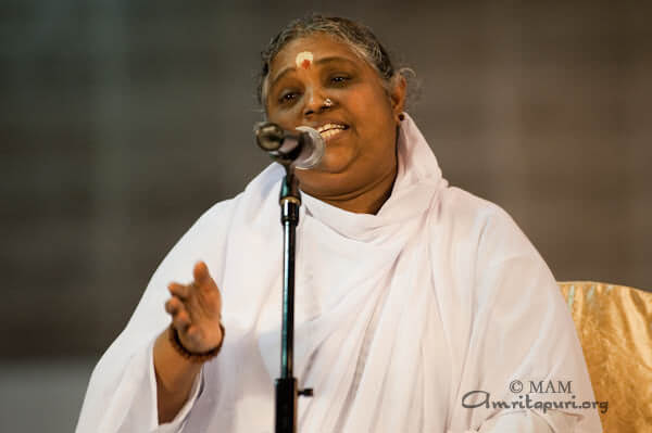 Amma speaking on New Year's Day 2010