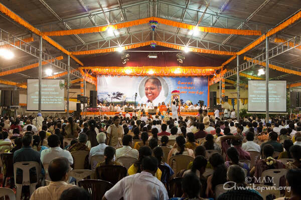 Amma sings bhajans on stage in Kovai