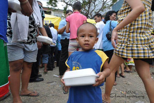 A child receiving a food package