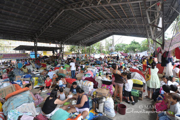 The homeless seeking shelter after a devastating fire in Manila