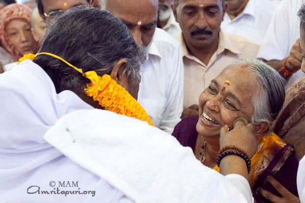 Amma gives darshan