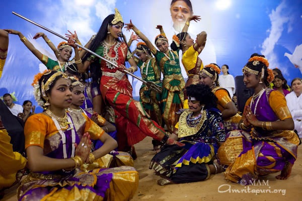 The students enacted the drama of Durga killing the demon Mahishasura