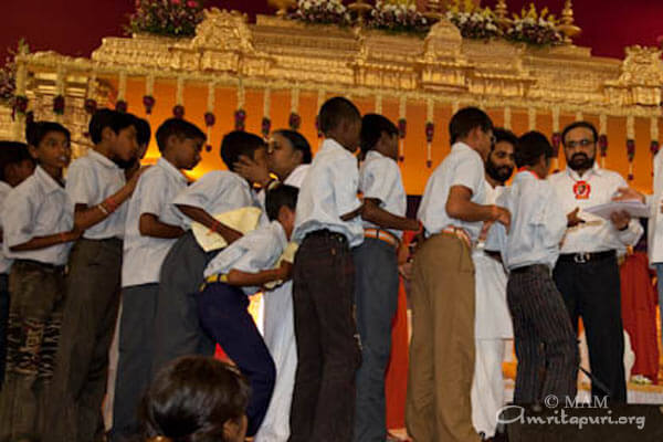 Amma giving away Vidyamritam scholarships to 500 more children of Andra Pradesh