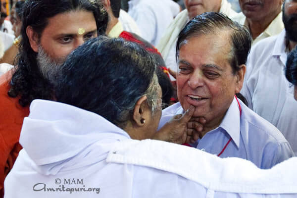 Amma giving darshan