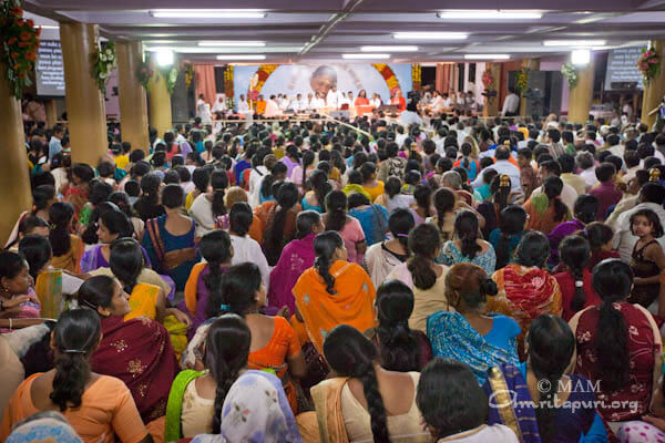 Devotees listening to Amma in Pune
