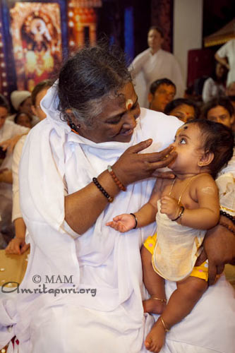 Annaprash: Amma giving the first solid food to a baby