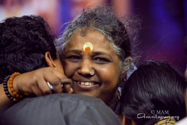 Amma's Darshan: the eyes of compassion