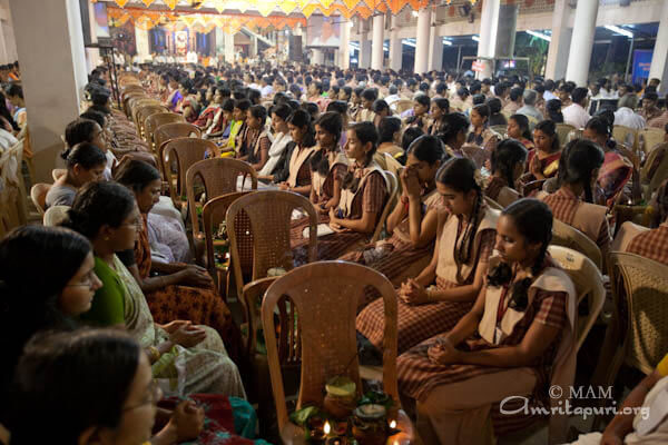 Amma's devotees participating in Sani puja