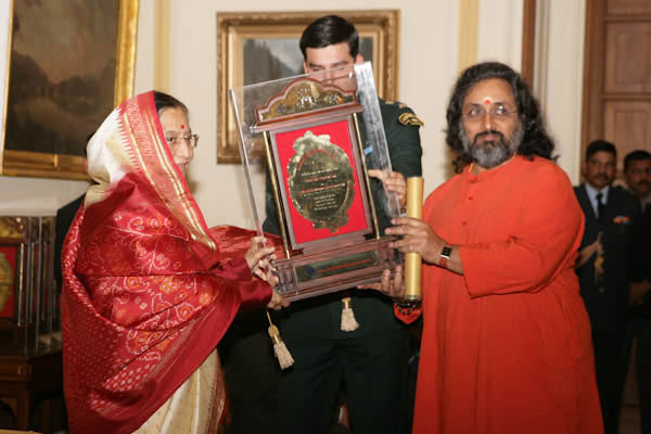 Swamiji accepted the award on behalf of MAM