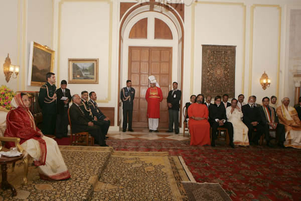 Swamiji is seated next to the other award recipients in their respective fields