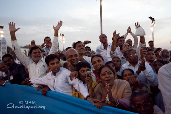 Devotees greeting Amma