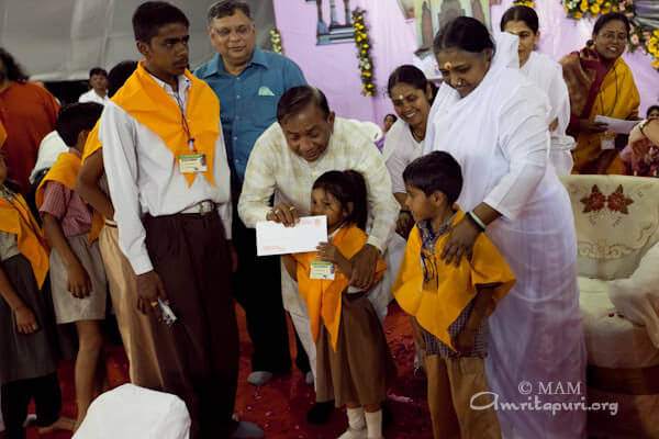 Amma gives Vidyamritam scholarships