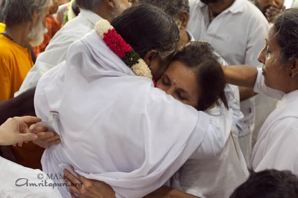Amma giving darshan in Vasanth Kunj