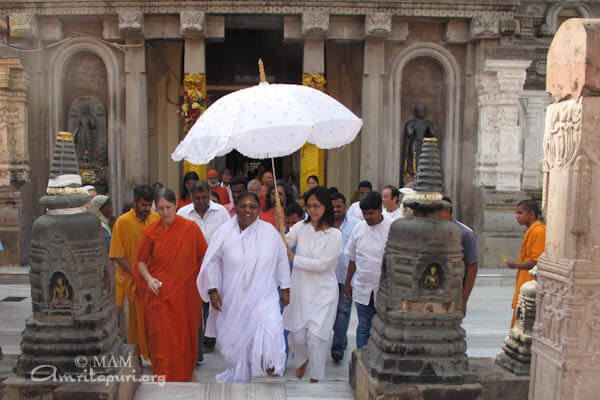 Amma in front of the temple