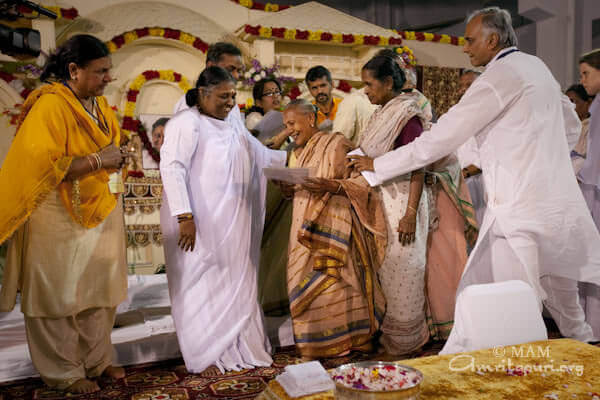 Amma giving Amrita Nidhi - free monthly pension